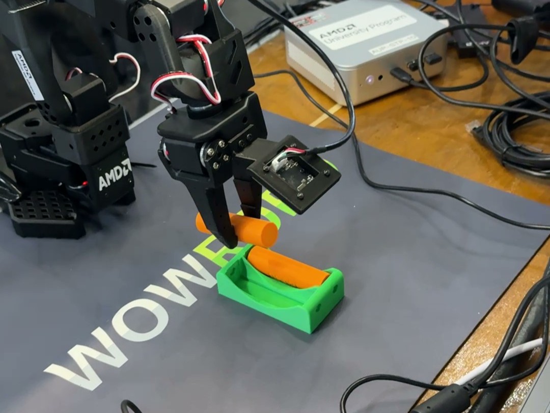 Robot arm placing an 18650 cell